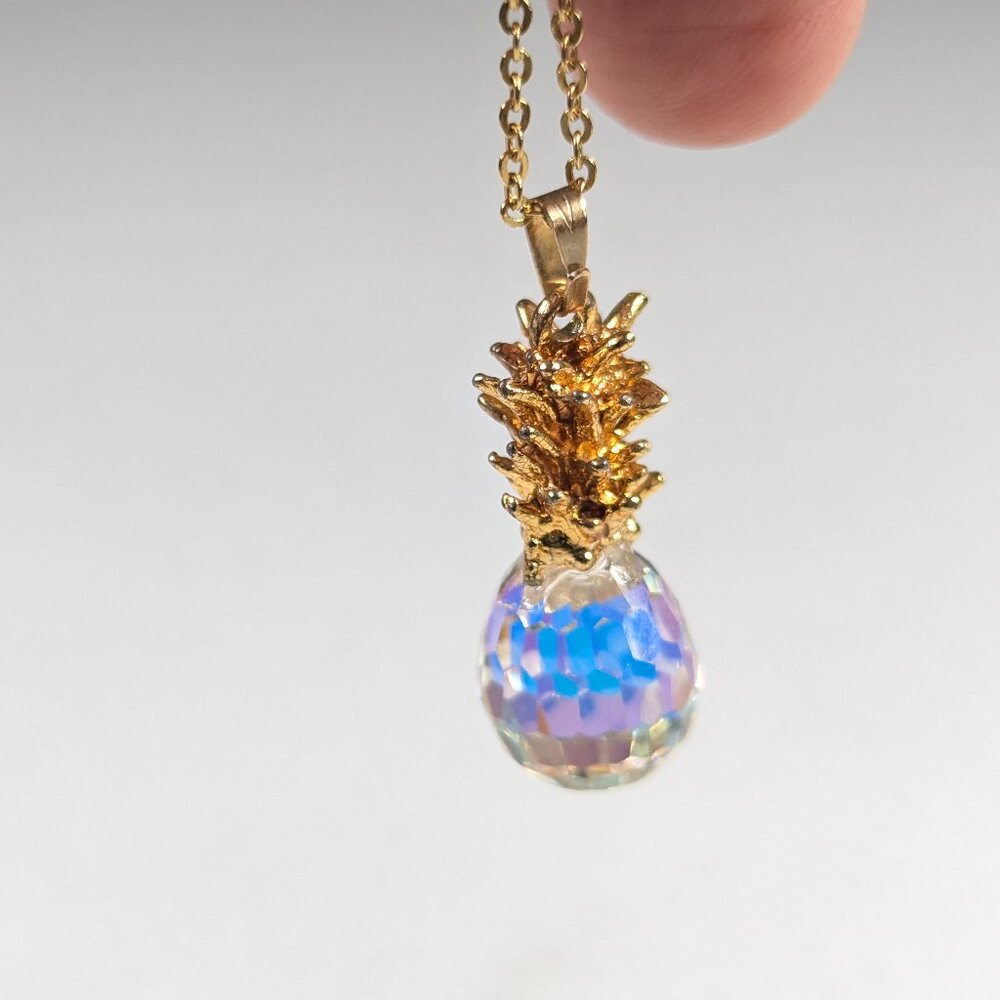 Small Aurora Borealis crystal pineapple pendant with gold tone necklace